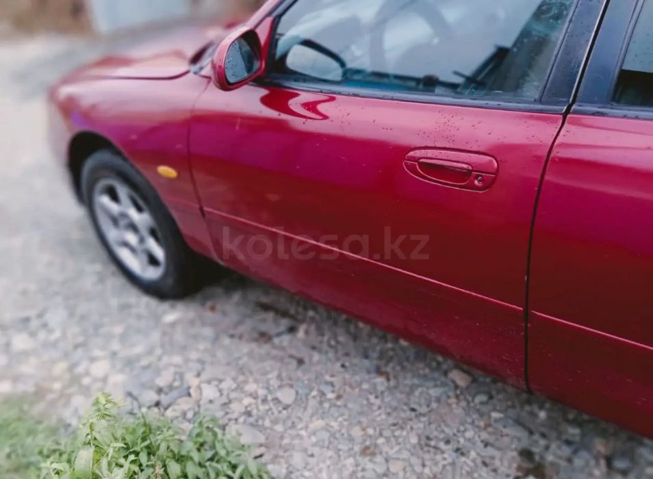 Мазда кронос 1994года