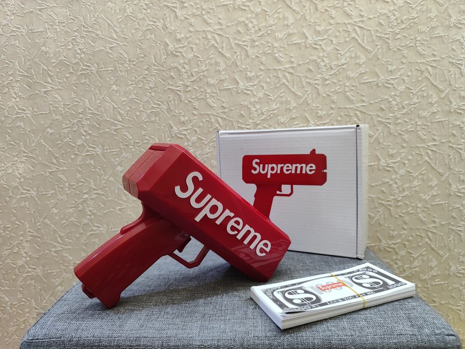 Продам новый денежный пистолет Supreme