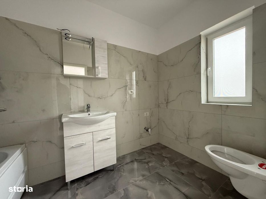 Duplex pe parter – compartimentare excelentă, teren generos.