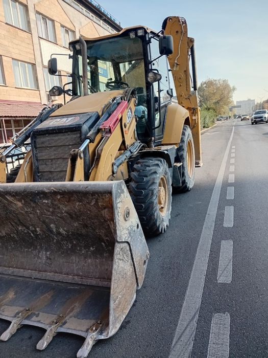 Услуги экскаватора погрузчика