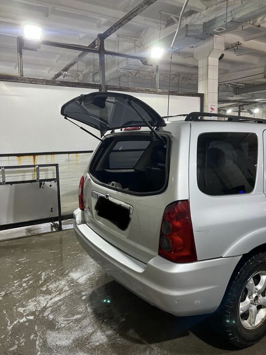 Продам Mazda Tribure
