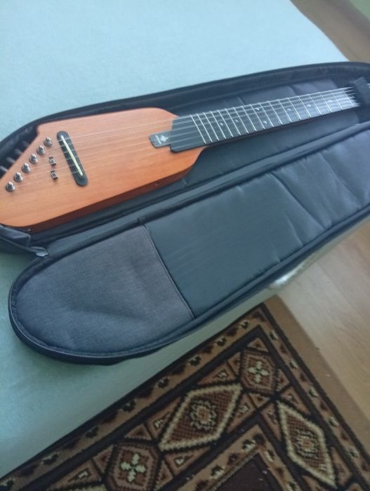 Продавам електроакостична китара    DONNER