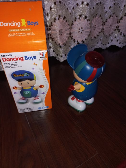 Продам игрушку музыкальная танцующий