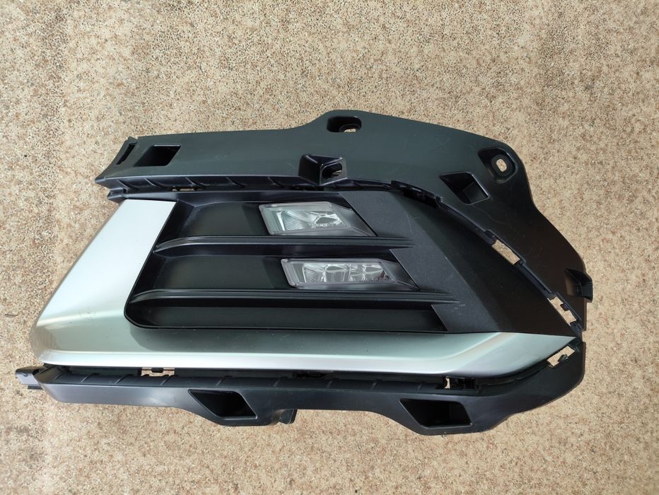 Левая противотуманная фара на Kia Sportage