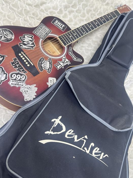 Акустическая гитара от бренда «Caravan Music»