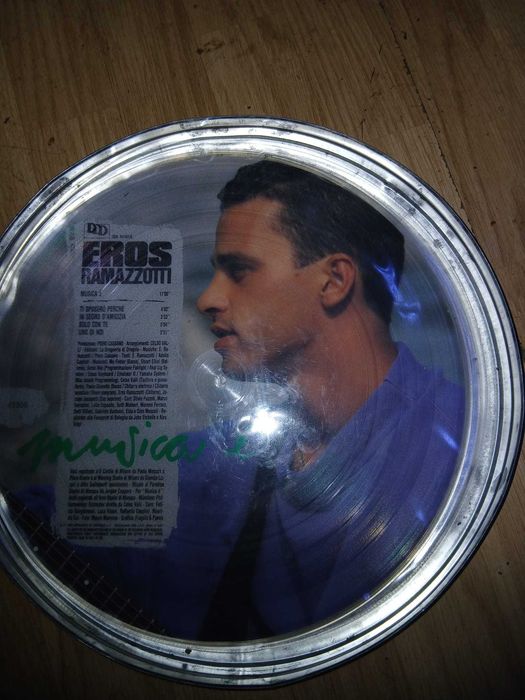 Eros Ramazzotti vinil in cutie de colecție rotundă de tablă