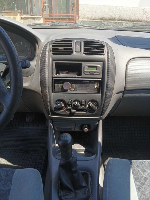 Mazda 323 1999г