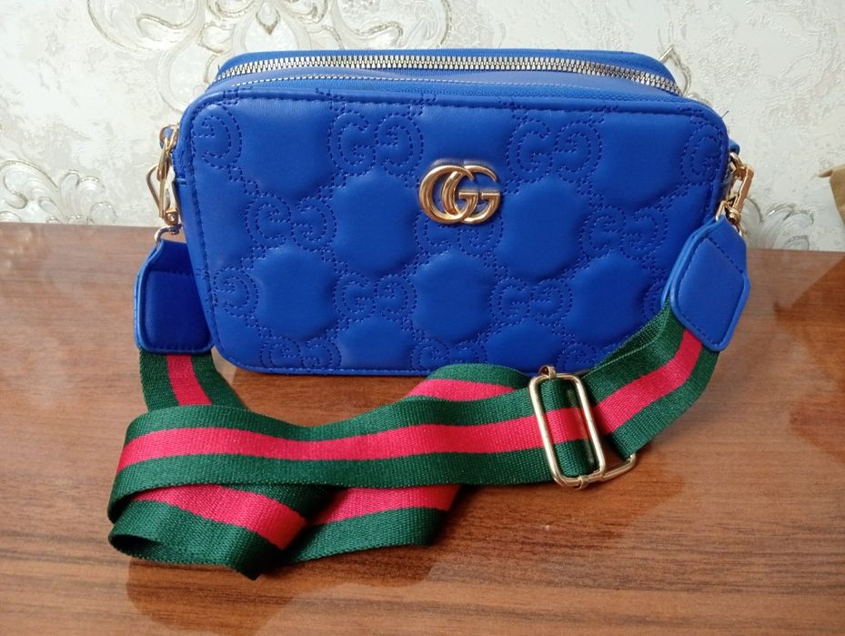 Клатч "Burberry", "Gucci".