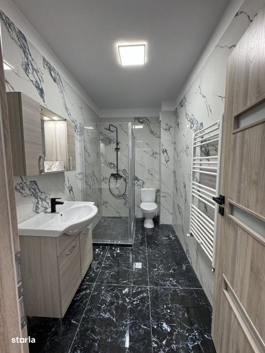 Apartament de Vanzare I SU 55mp I Balcon I Garaj - Terra