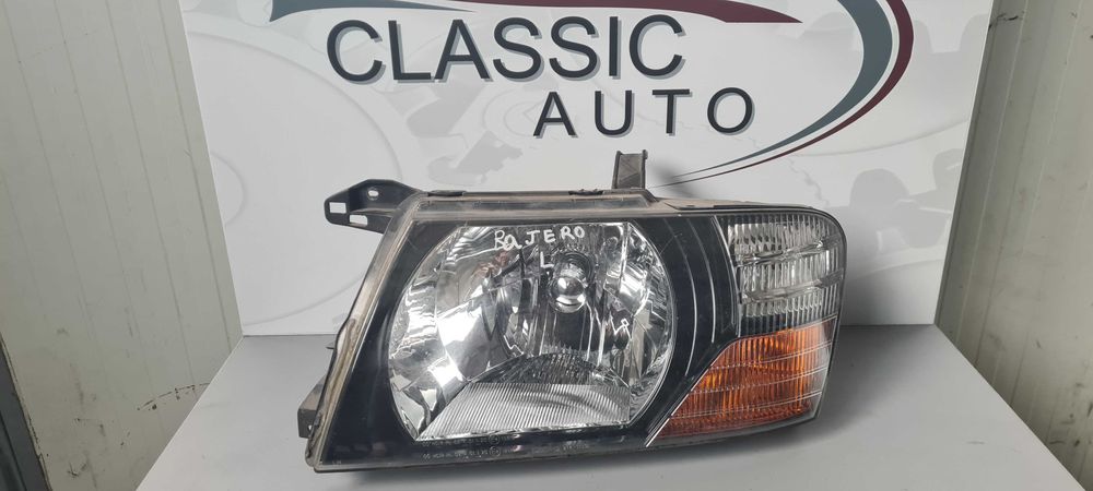 Фар Mitsubishi Pajero 2003г.