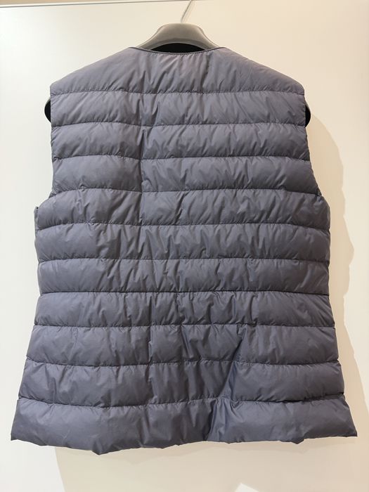 Продам жилет Uniclo