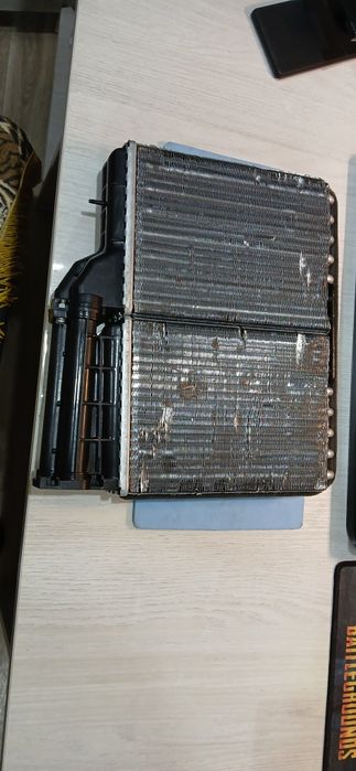 Продам новый радиатор печки е 34