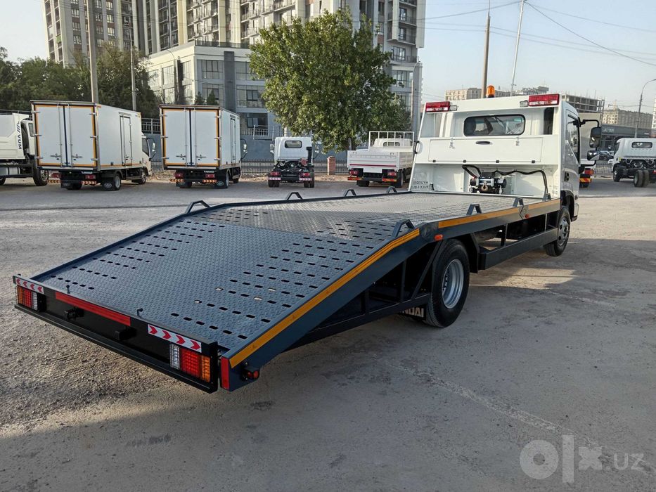 Эвакуатор с ломаной платформой HYUNDAI EX8 3,5 т