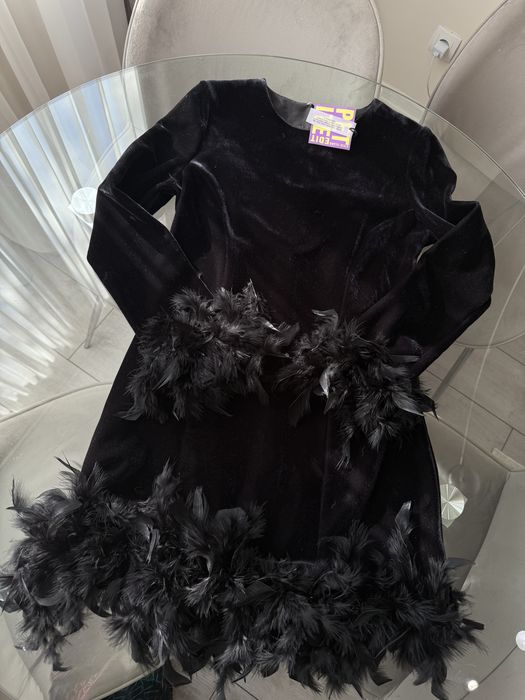 Рокля с пера.