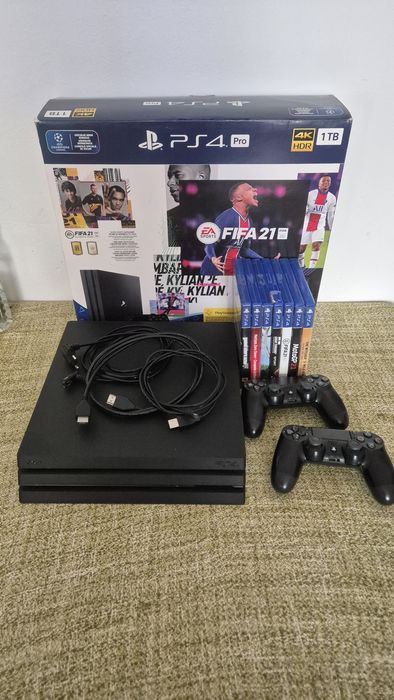 PlayStation 4 Pro cu 2 controller + 7 jocuri