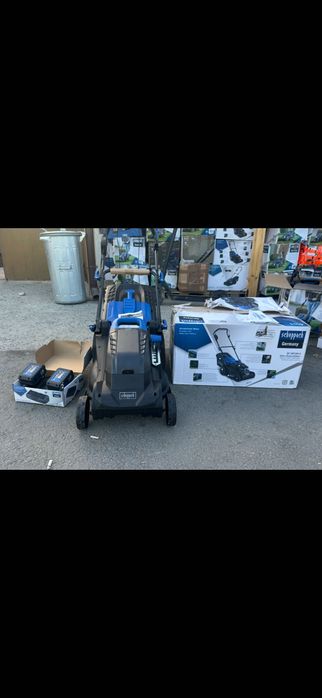 Акумулаторната косачка 380mm Scheppach плюс две батерии зарядно