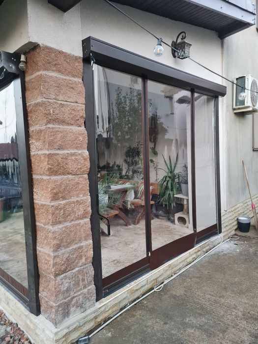 Închideri terase,folie transparentă capse și bride,rulouri cu manivelă.