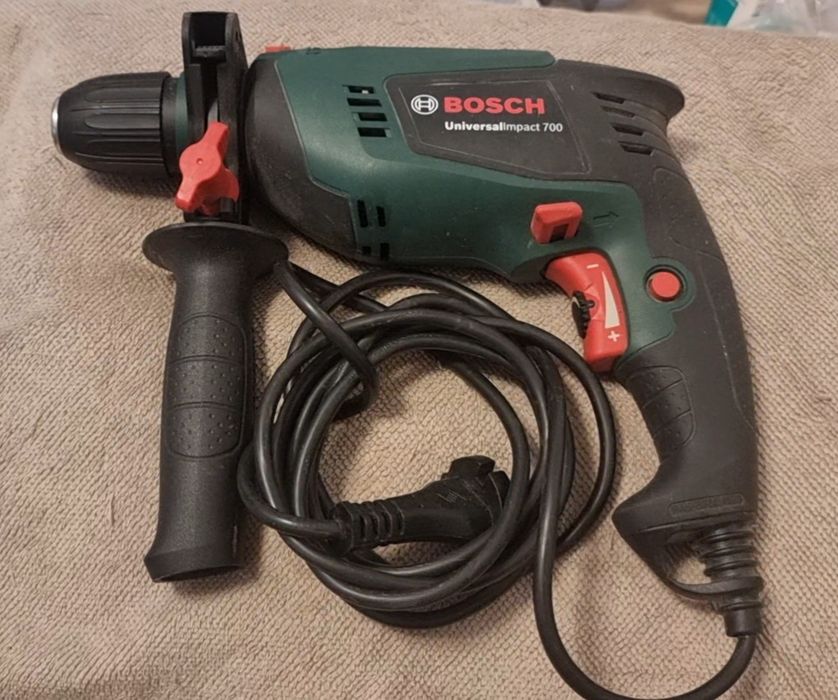 Masina de gaurit cu percutie, cu cablu, Bosch UniversalImpact 700, 701 W, 3000 rpm, mandrina rapida,