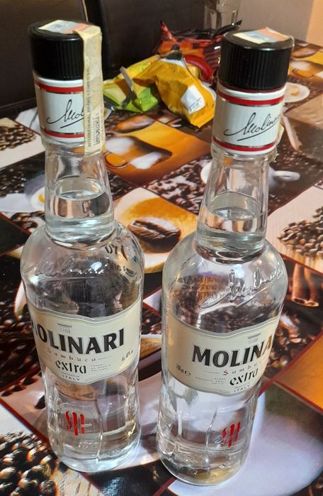 Vând urgent 2 sticle de lichior sambuca molnari  extra la  700.ml