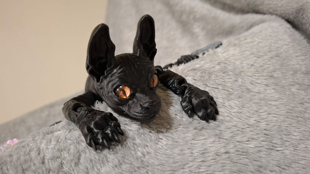 3-d игрушки в виде котиков сфинксов