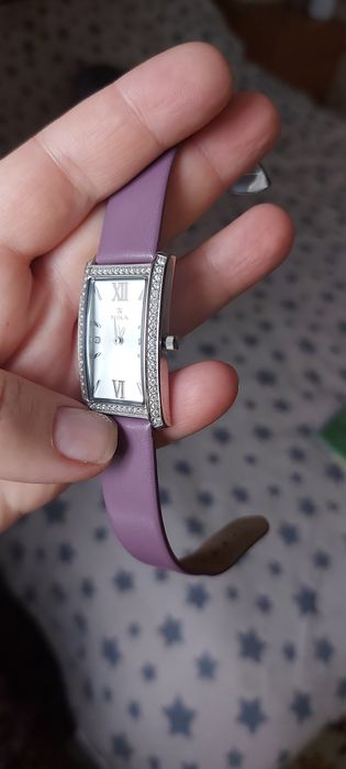 Серебряные часы Ника