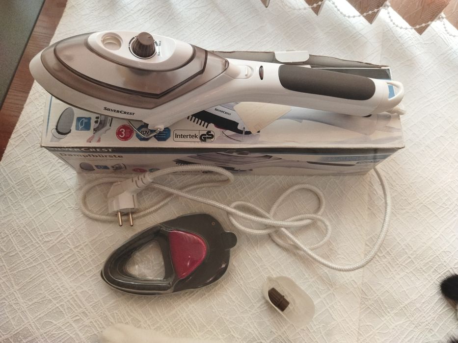 Пароочиститель. Отпариватель для одежды.