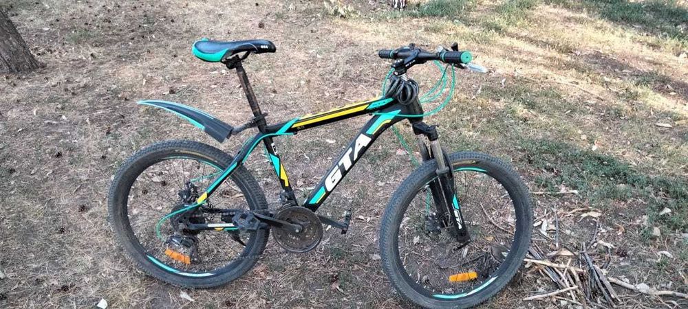 Велосипед сатылады. Продается велосипед.