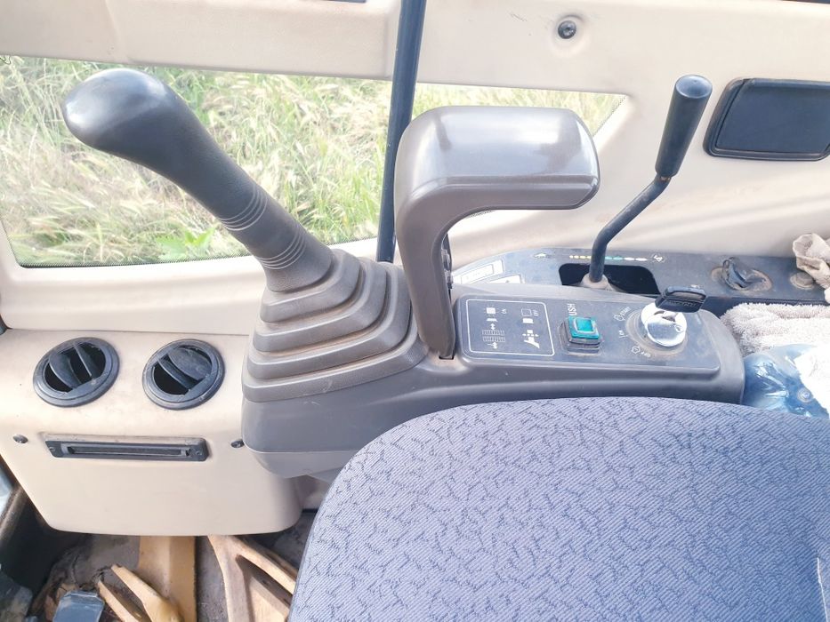 Vând miniexcavator în stare foarte buna