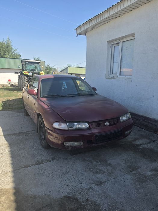 Продам мазду кронос седан