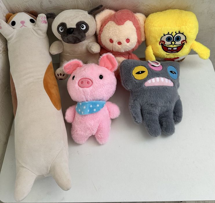 Игрушки мягкие хватайка