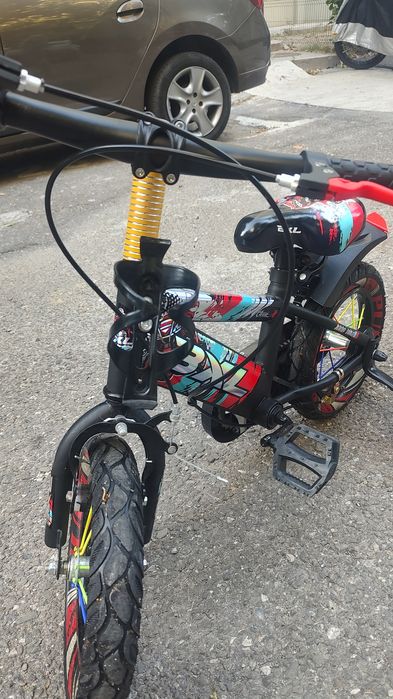 Vând bicicleta copii cu roti ajutatoare