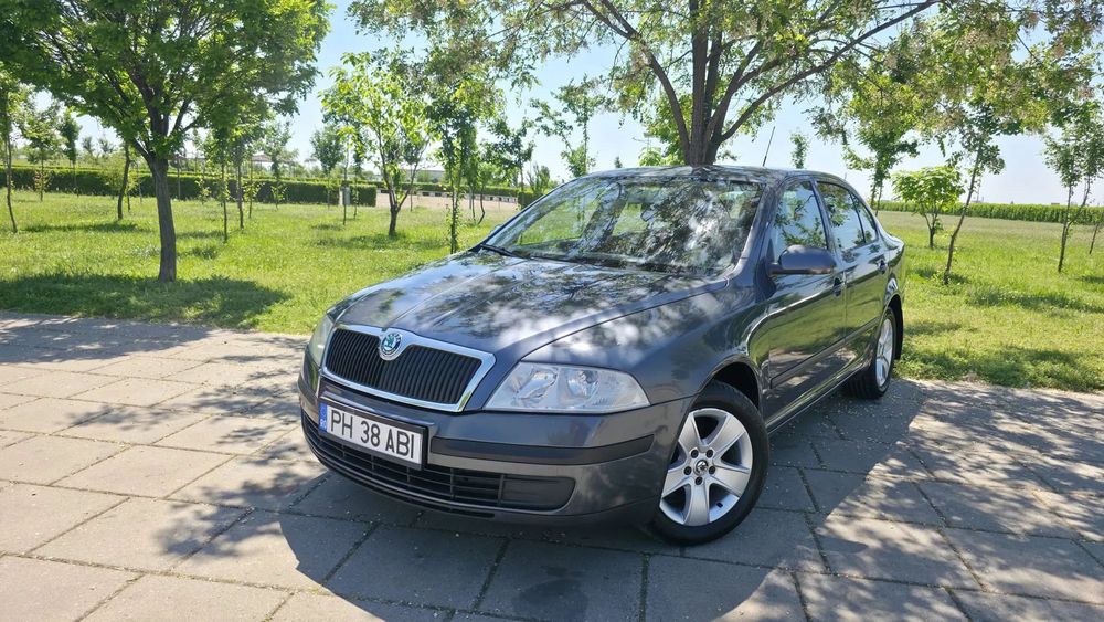 Skoda Octavia 1.9TDI 105Cp, Dublu Climatroni, Geamuri electrice,2 Seturi de roti