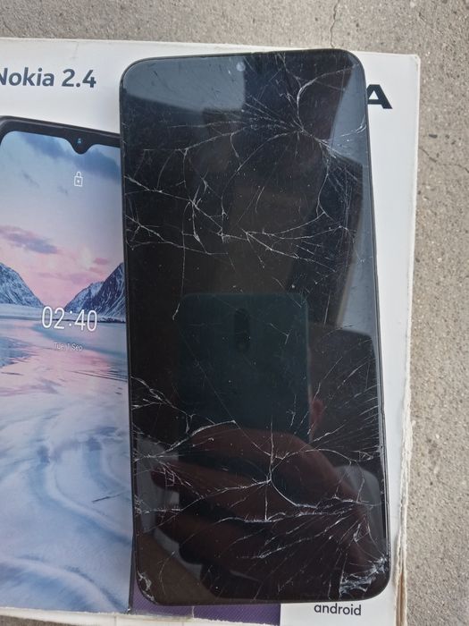 Телефони за части