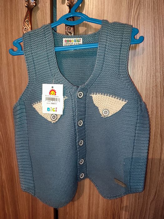 Детские вязаные жилетки