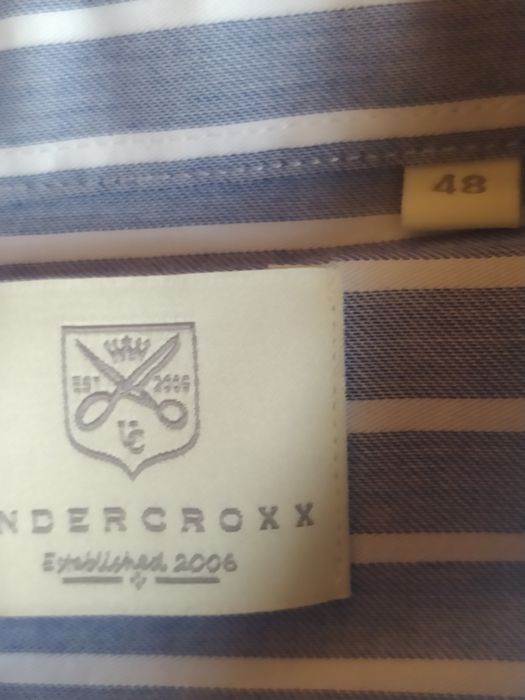 Продам рубашку на мальчика 13 -15 лет.