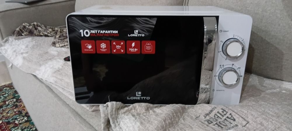 Продам новую микроволнованную печь