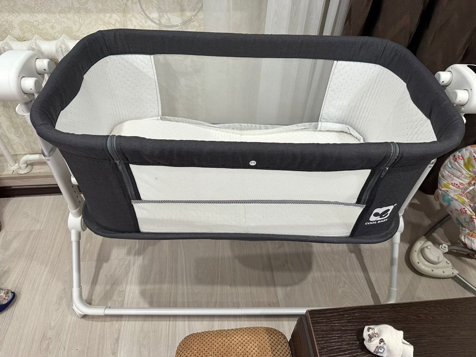 Детская кроватка с маятниковым приводом