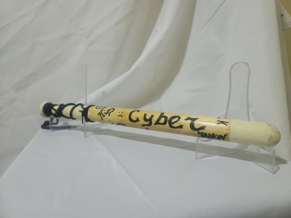 Kaleksiya uchun softbol tayoĝi