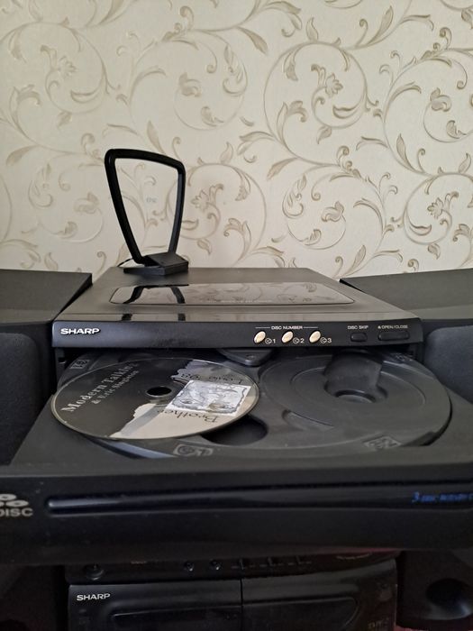 Продам  музыкальный центр  SHARP  в хорошем состоянии.