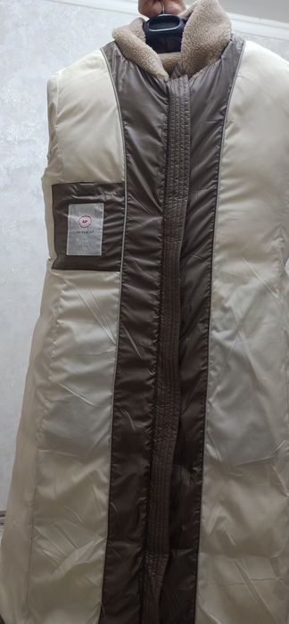 Пуховик женский длинный