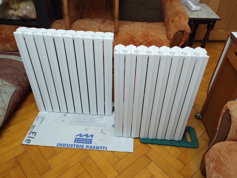 2 Calorifere de fontă,aproape noi