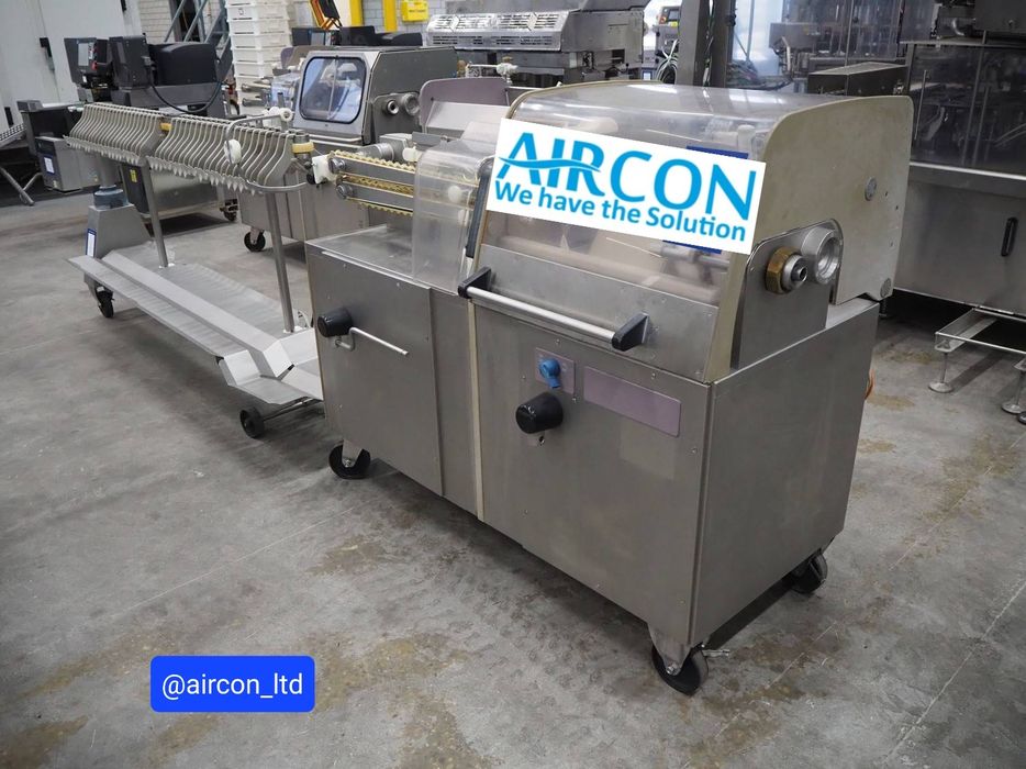 Handtmann Машина за връзване/пресукване  и окачване