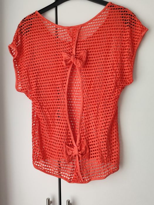 Bluza perforată cu fundițe