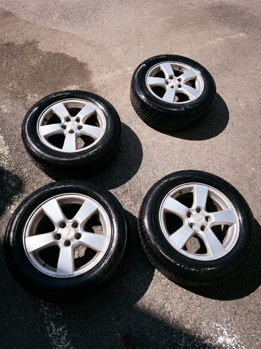 Алуминиеви джанти 16" 5х105 за Chevrolet Cruze / Opel + 8 бр. гуми 205/60 R16 (Semperit + Bridgestone)