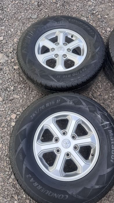 Диски  от Паджеро  Р16  с шинами