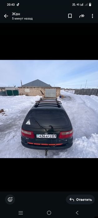 Тайота  Карина е