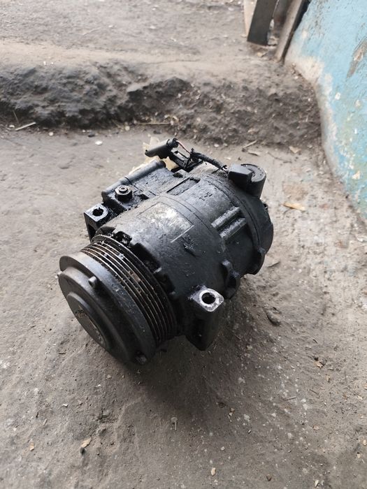 Компрессор кондиционера .