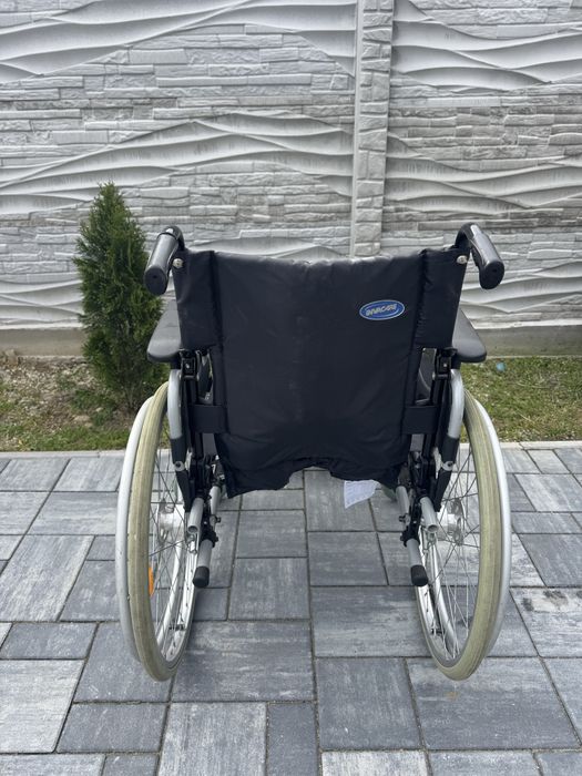 Carucior handicap pliabil