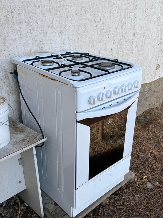 Индезит газ плита  электрический