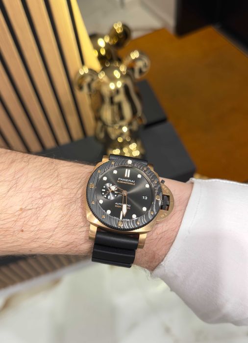 panerai luminor submersible gold/black